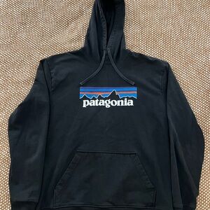 Patagonia Black Hoodie with Blue and Red Logo